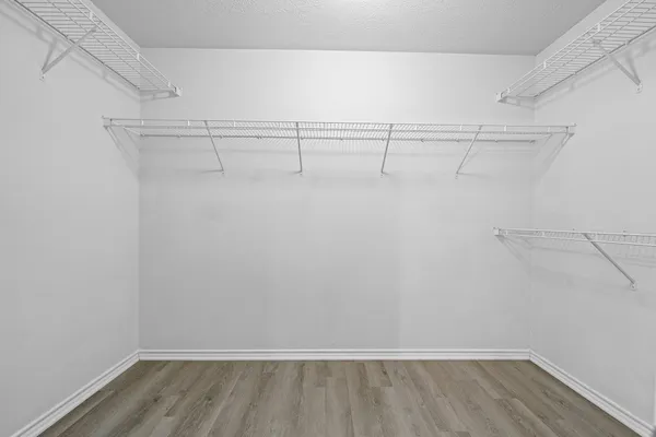 a view of a room with racks on the wall