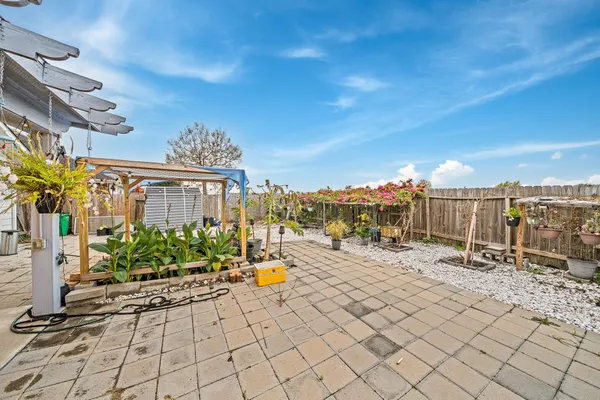 a view of a terrace with sitting area