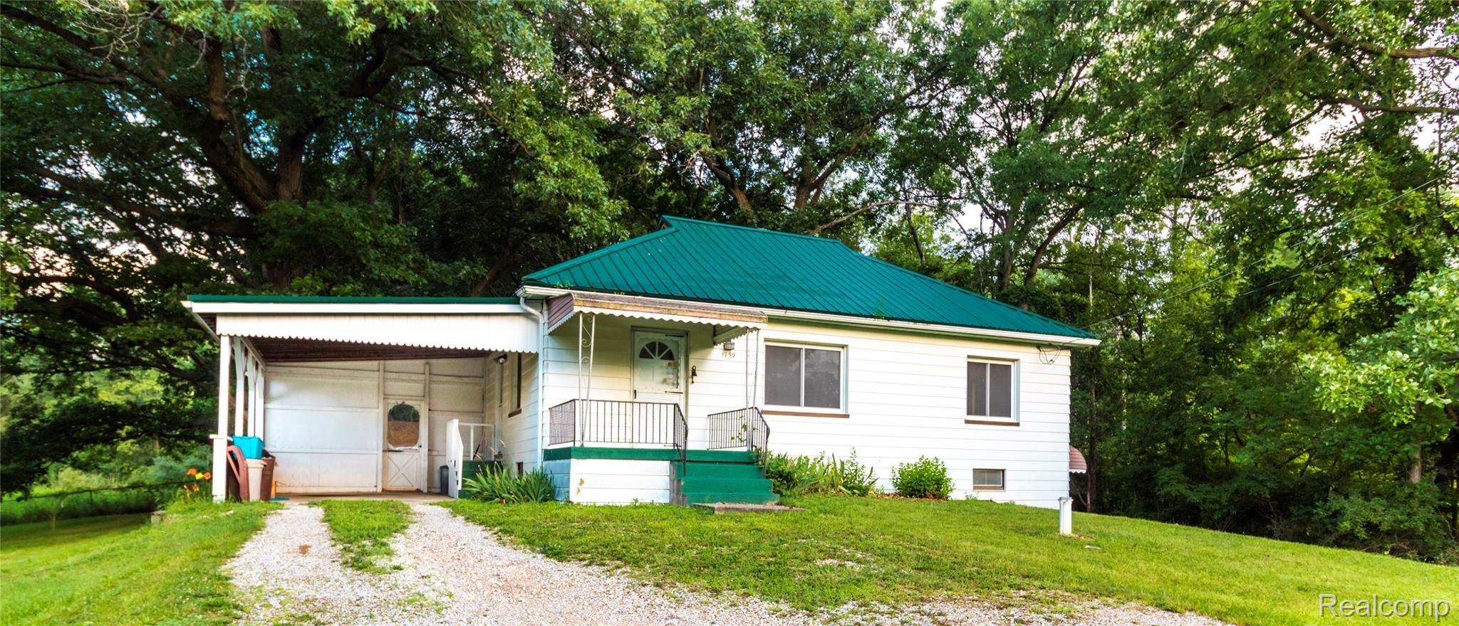 1759 Millville Road Lapeer, MI 48446 - Photo 2 of 23 Front.jpg