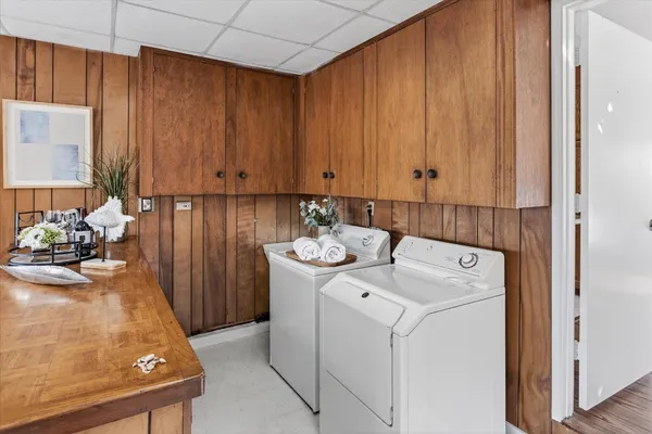 a utility room with dryer and washer