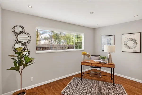 a room with furniture and a window