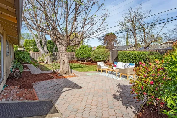 a view of a backyard house and a garden