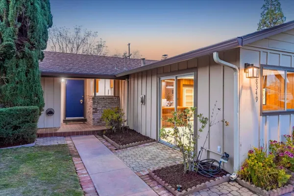 a house view with a garden space