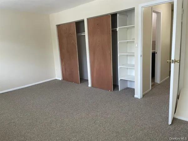 an empty room with closet
