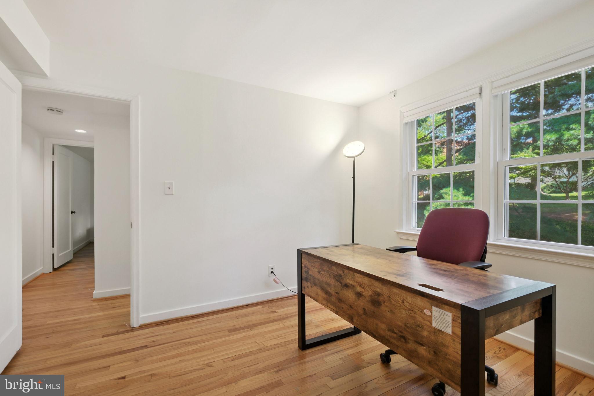 8203 Grubb Road, Unit 201 Silver Spring, MD 20910 - Photo 17 of 26 a view of a workspace with furniture