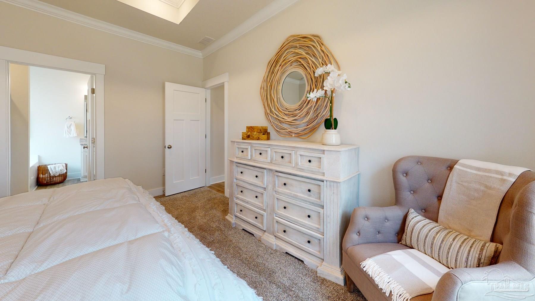 4531 Jude Way Pace, FL 32571 - Photo 20 of 43 a bedroom with a bed and couch