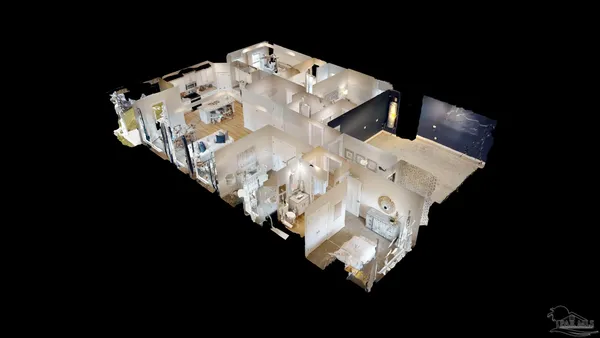 a close up of a white vase with flowers