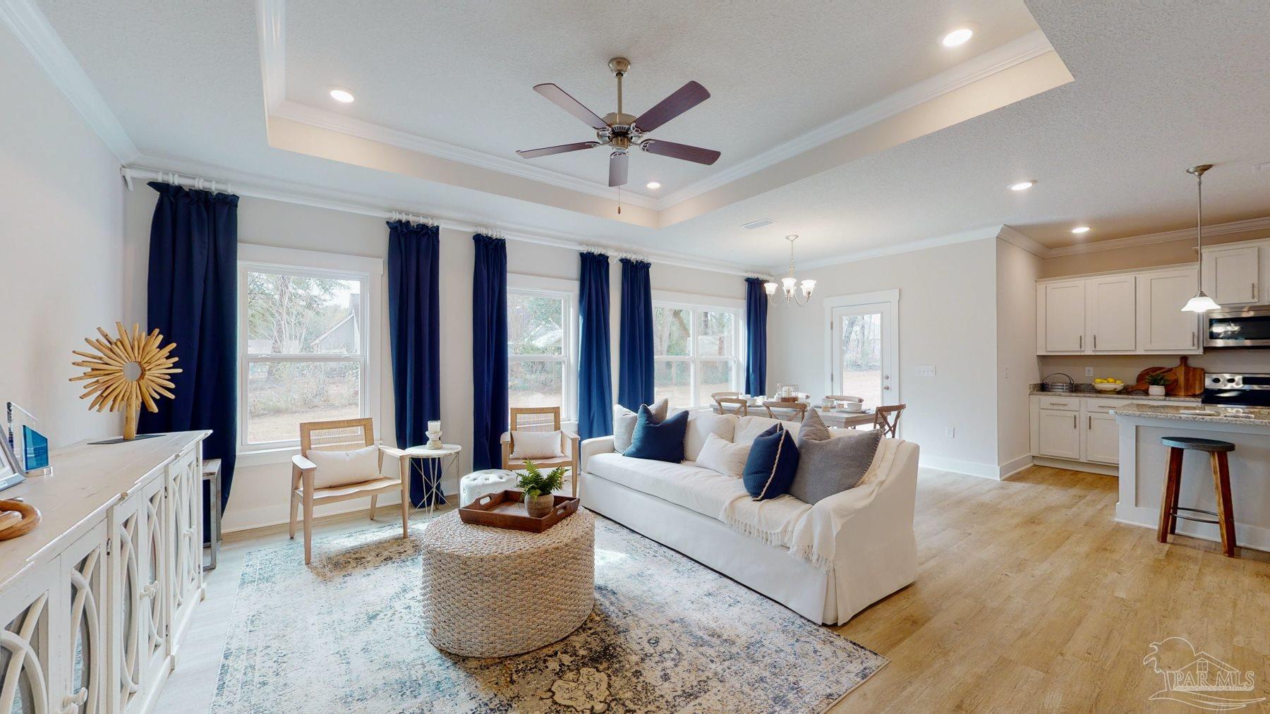 4531 Jude Way Pace, FL 32571 - Photo 5 of 43 a living room with furniture and a large window