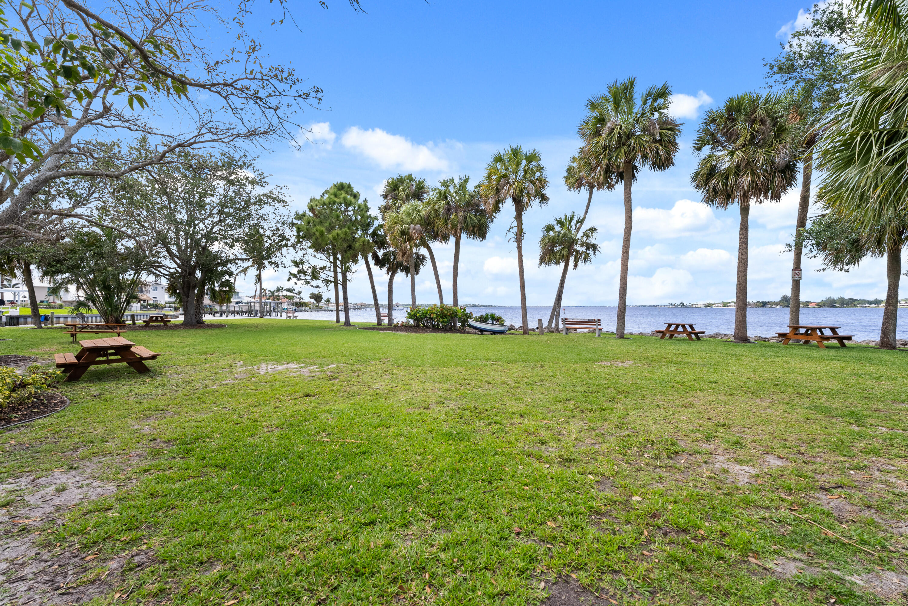 1459 Southwest Seahawk Way Palm City, FL 34990 - Photo 43 of 43 a view of yard with swimming pool and green space