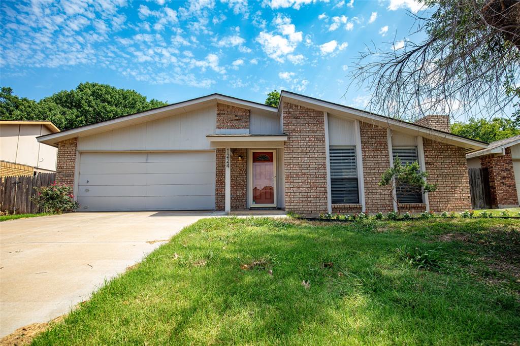 1224 Burmeister Road Fort Worth, TX 76134 - Photo 1 of 1 a front view of a house with a garden