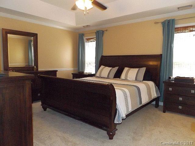 1033 Kilpatrick Lane Fort Mill, SC 29708 - Photo 12 of 24 a bedroom with a bed and a window