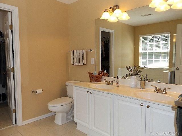 1033 Kilpatrick Lane Fort Mill, SC 29708 - Photo 13 of 24 a bathroom with a toilet sink and mirror