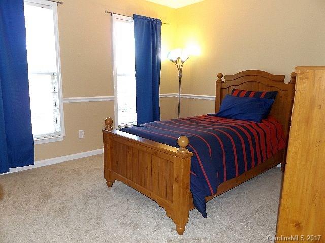 1033 Kilpatrick Lane Fort Mill, SC 29708 - Photo 15 of 24 a bedroom with a bed and a window