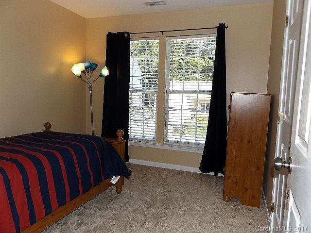 1033 Kilpatrick Lane Fort Mill, SC 29708 - Photo 16 of 24 a bedroom with a bed and a window