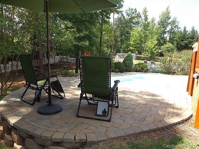 1033 Kilpatrick Lane Fort Mill, SC 29708 - Photo 22 of 24 a view of a backyard with sitting area