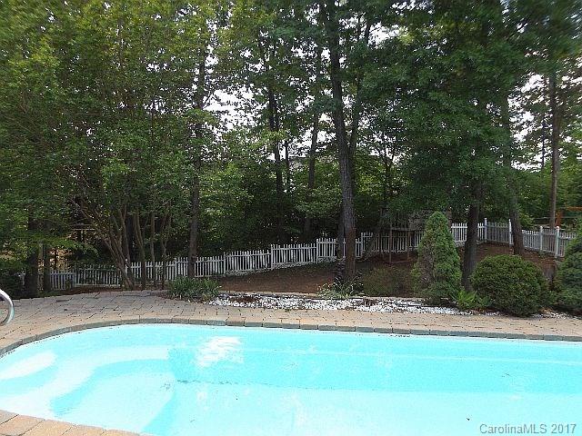 1033 Kilpatrick Lane Fort Mill, SC 29708 - Photo 23 of 24 a view of a backyard with trees