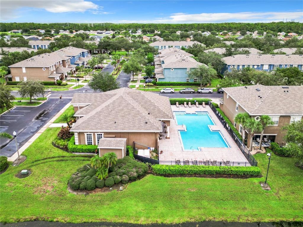 3309 Wilshire Way Road, Unit 3 Orlando, FL 32829 - Photo 39 of 43 an aerial view of residential houses with outdoor space and trees