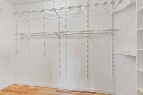 a view of an empty walk in closet