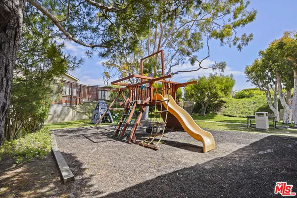a view of a park with slide
