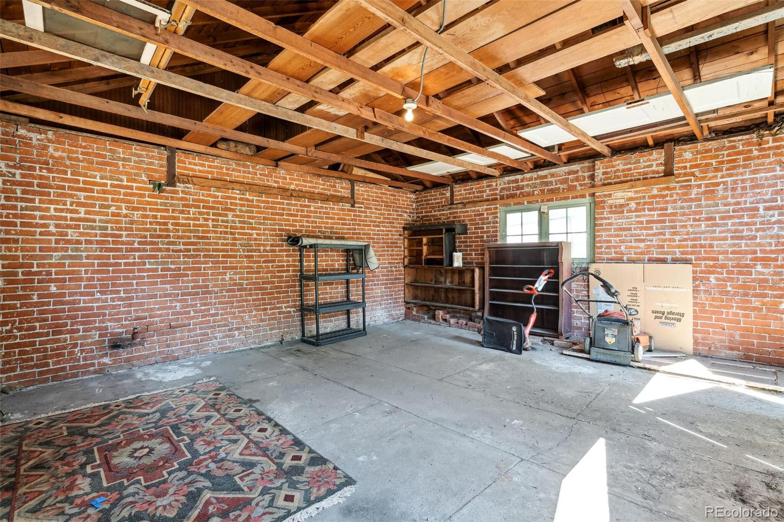 3921 Meade Street Denver, CO 80211 - Photo 23 of 27 a view of a garage with chairs