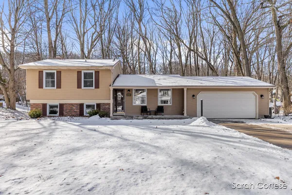 $465,000 | 6150 Winthrop Court Southeast, Ada, MI 49301