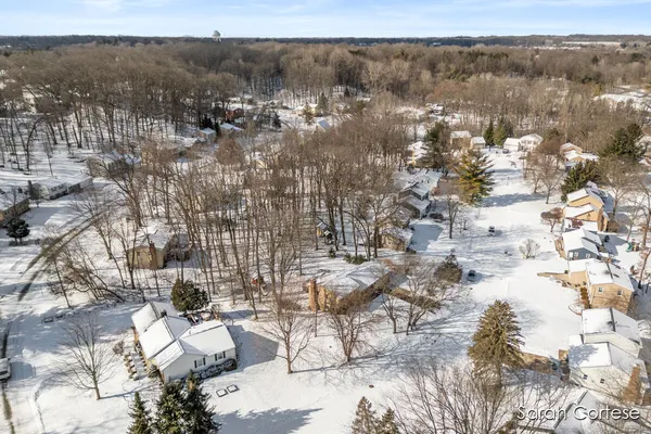 $465,000 | 6150 Winthrop Court Southeast, Ada, MI 49301