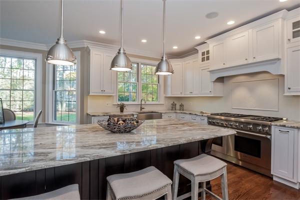 49 Westgate Road Newton, MA 02459 - Photo 11 of 27 a kitchen with a stove a window and chairs