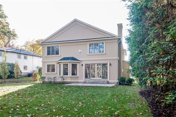 49 Westgate Road Newton, MA 02459 - Photo 24 of 27 a front view of a house with a yard