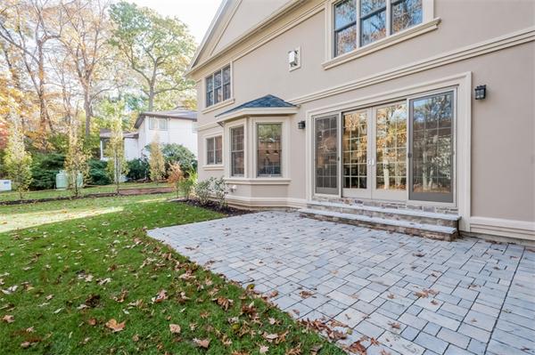 49 Westgate Road Newton, MA 02459 - Photo 25 of 27 front view of a house with a yard
