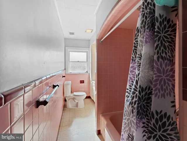 a bedroom with furniture and a bed