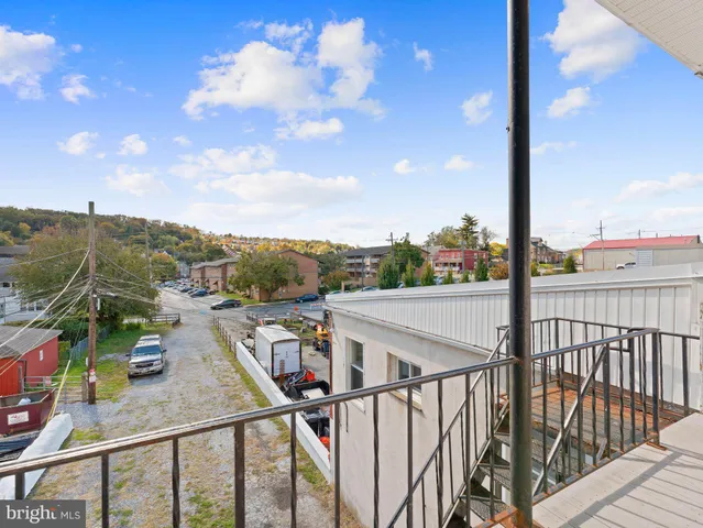 a car parked on the side of a street