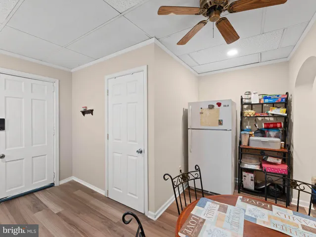 a bedroom with a bed and a desk