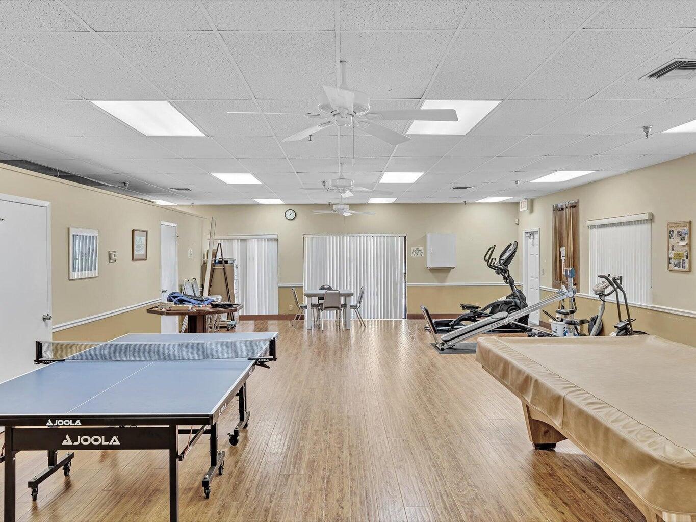 5321 Poppy Place, Unit 203 Delray Beach, FL 33484 - Photo 31 of 31 a view of a room with gym equipment