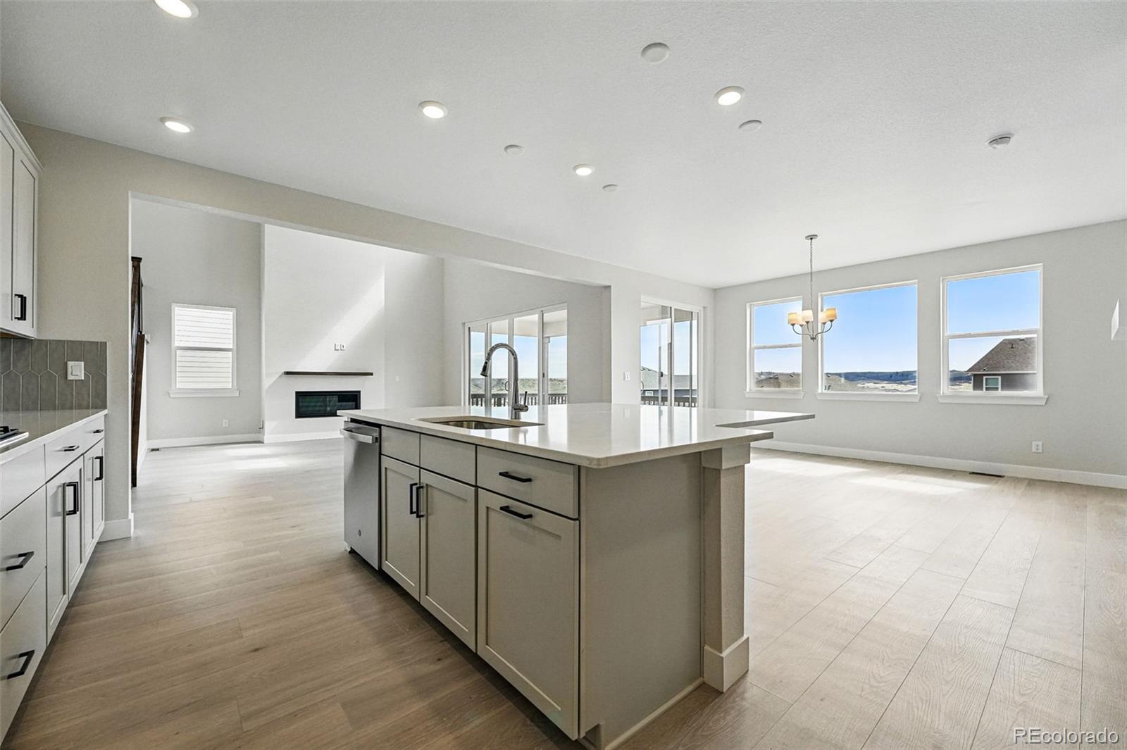 5722 Farrier Point Castle Rock, CO 80104 - Photo 18 of 41 a large kitchen with stainless steel appliances lots of counter top space