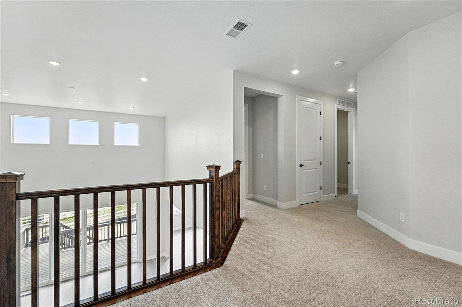 5722 Farrier Point Castle Rock, CO 80104 - Photo 19 of 41 a view of hallway with stairs
