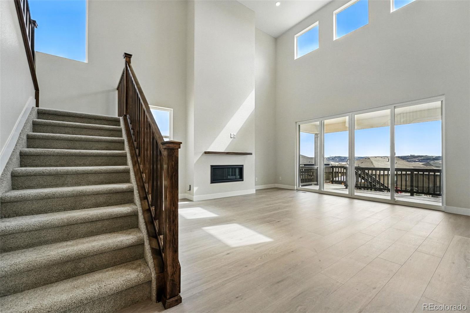 5722 Farrier Point Castle Rock, CO 80104 - Photo 2 of 41 a view of an entryway with wooden floor