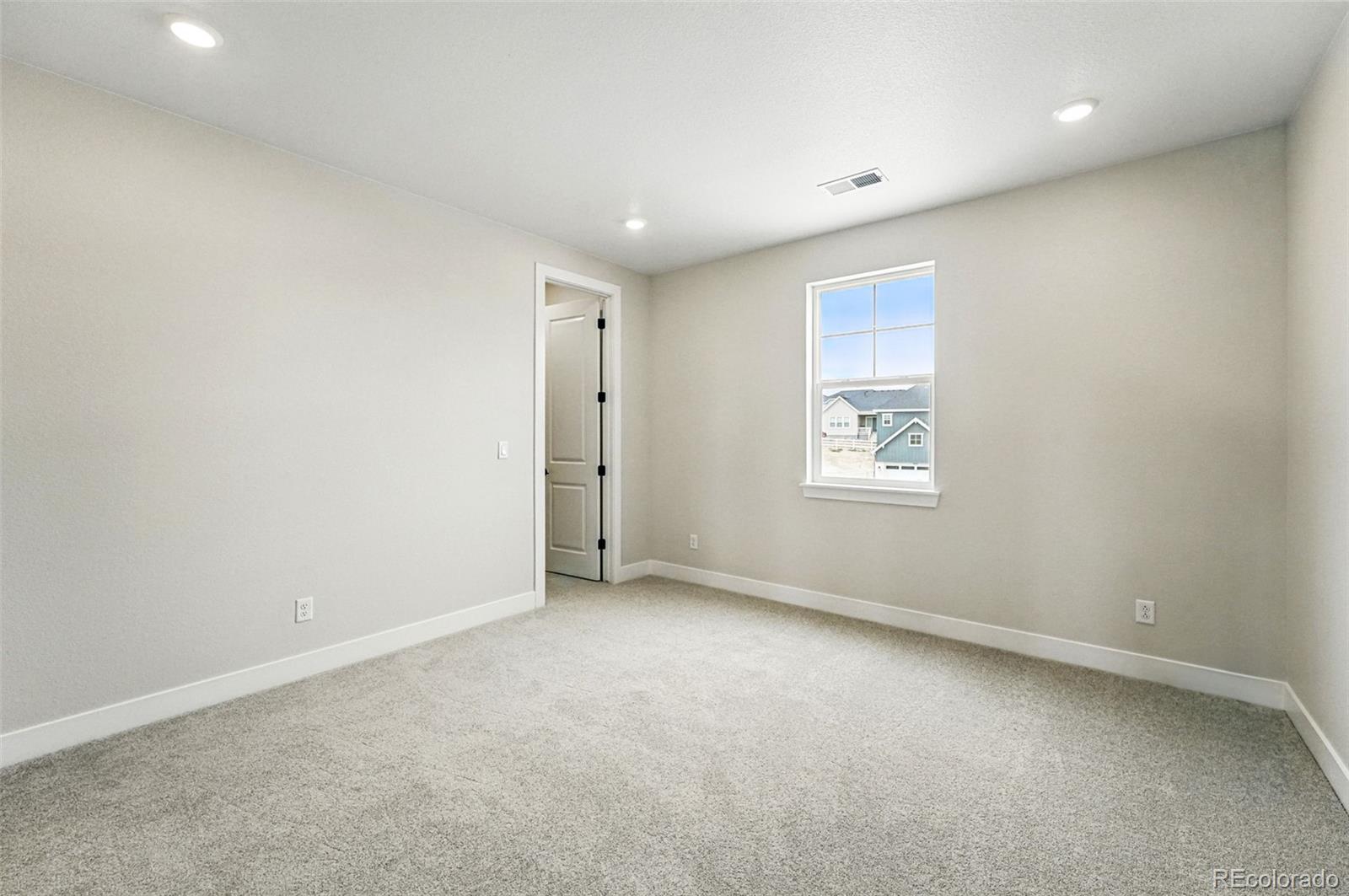 5722 Farrier Point Castle Rock, CO 80104 - Photo 27 of 41 an empty room with a entryway