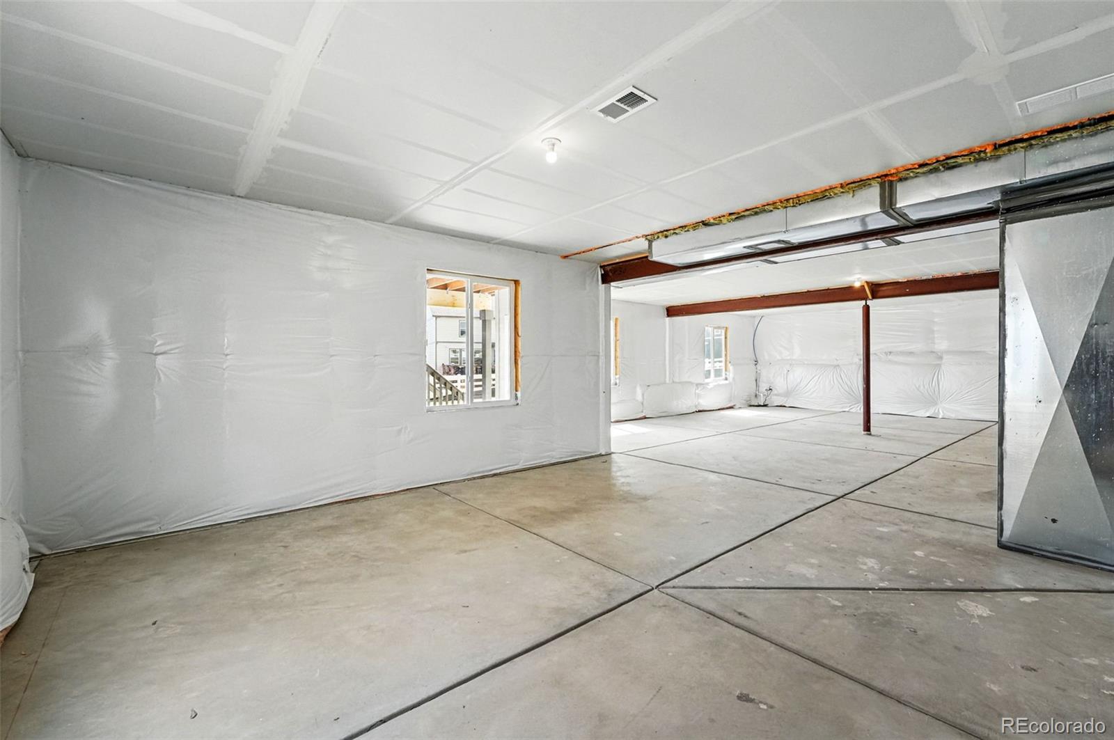 5722 Farrier Point Castle Rock, CO 80104 - Photo 31 of 41 a view of an empty room with a window