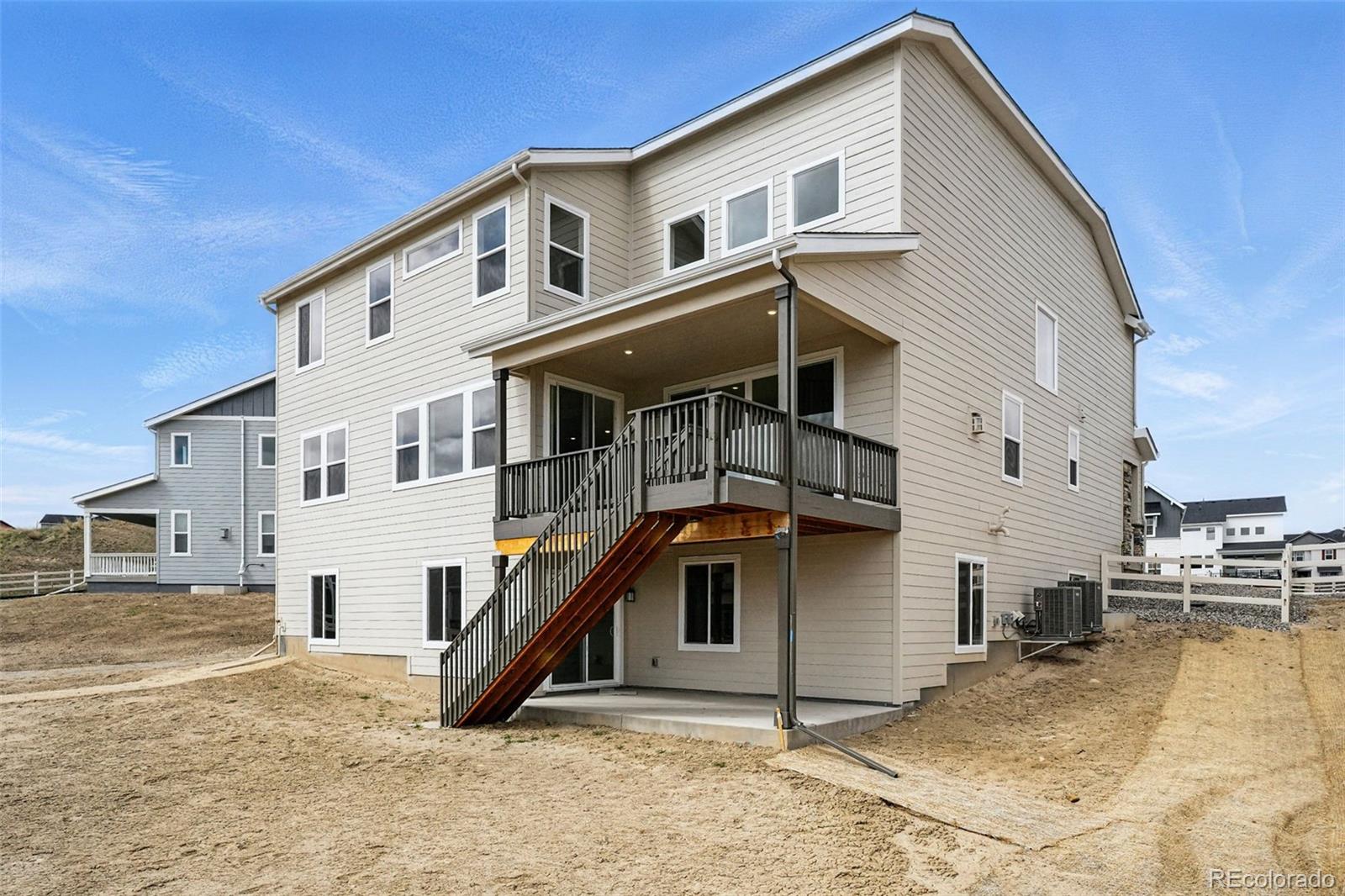 5722 Farrier Point Castle Rock, CO 80104 - Photo 33 of 41 a front view of a house with a yard