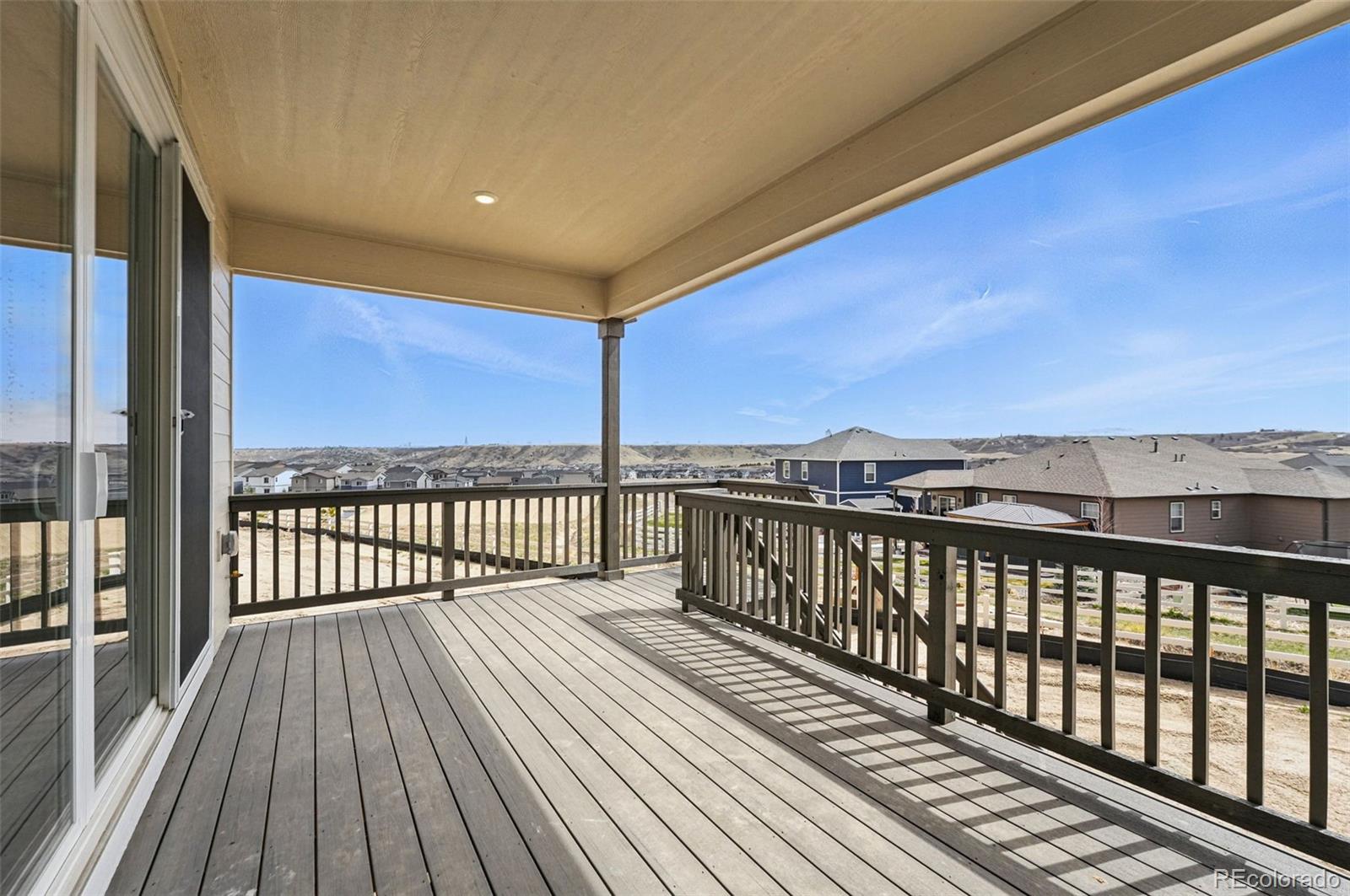 5722 Farrier Point Castle Rock, CO 80104 - Photo 5 of 41 a view of balcony with wooden floor