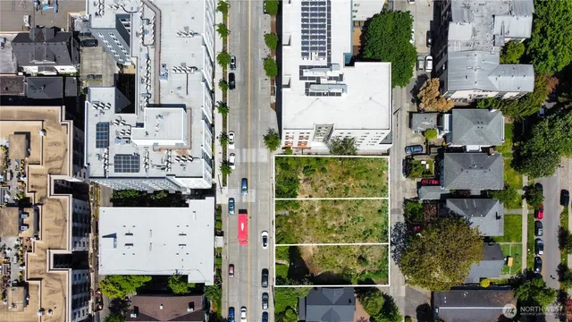 an aerial view of a city with lots of residential buildings