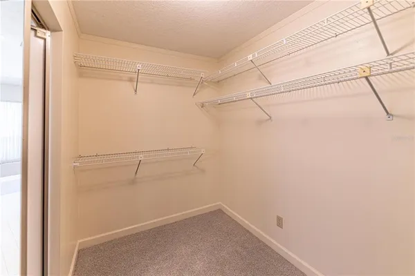 a view of a room with racks on the wall