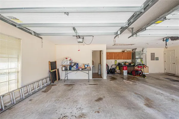 a view of a garage with rack and bicycle