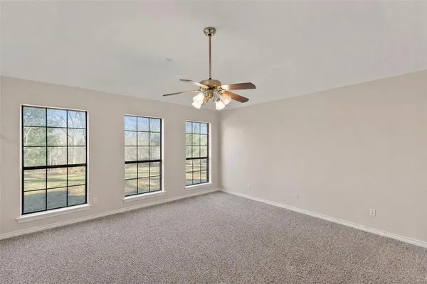 a bathroom with a sink double vanity and a mirror