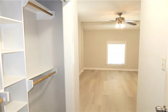 a view of a closet in a room