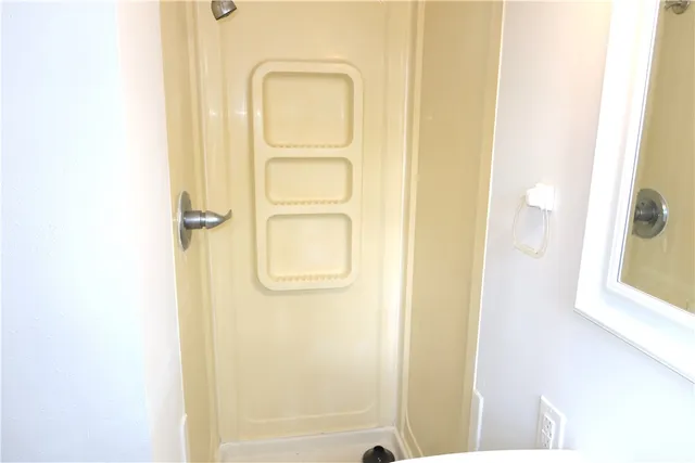 a view of front door with a bathroom