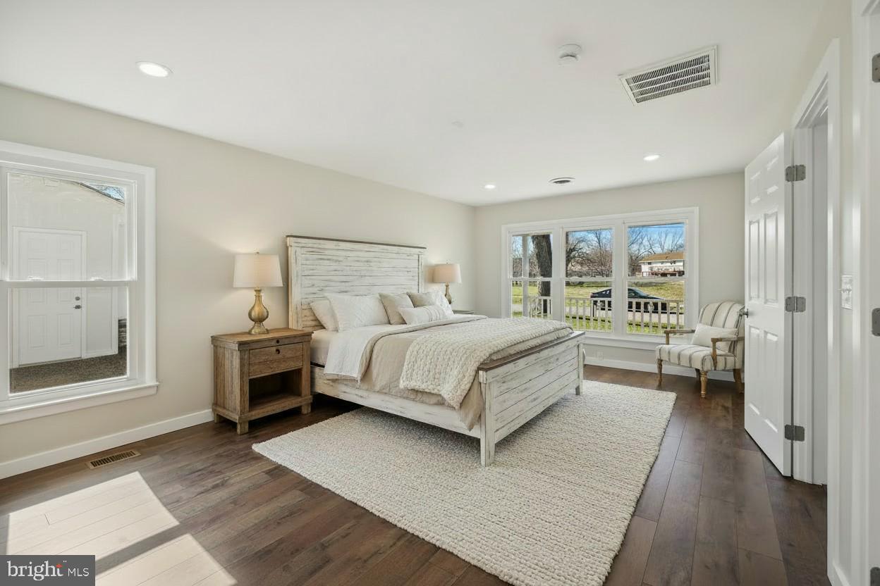 1546 Ridgely Drive Edgewater, MD 21037 - Photo 24 of 55 a bedroom with a bed and a large window