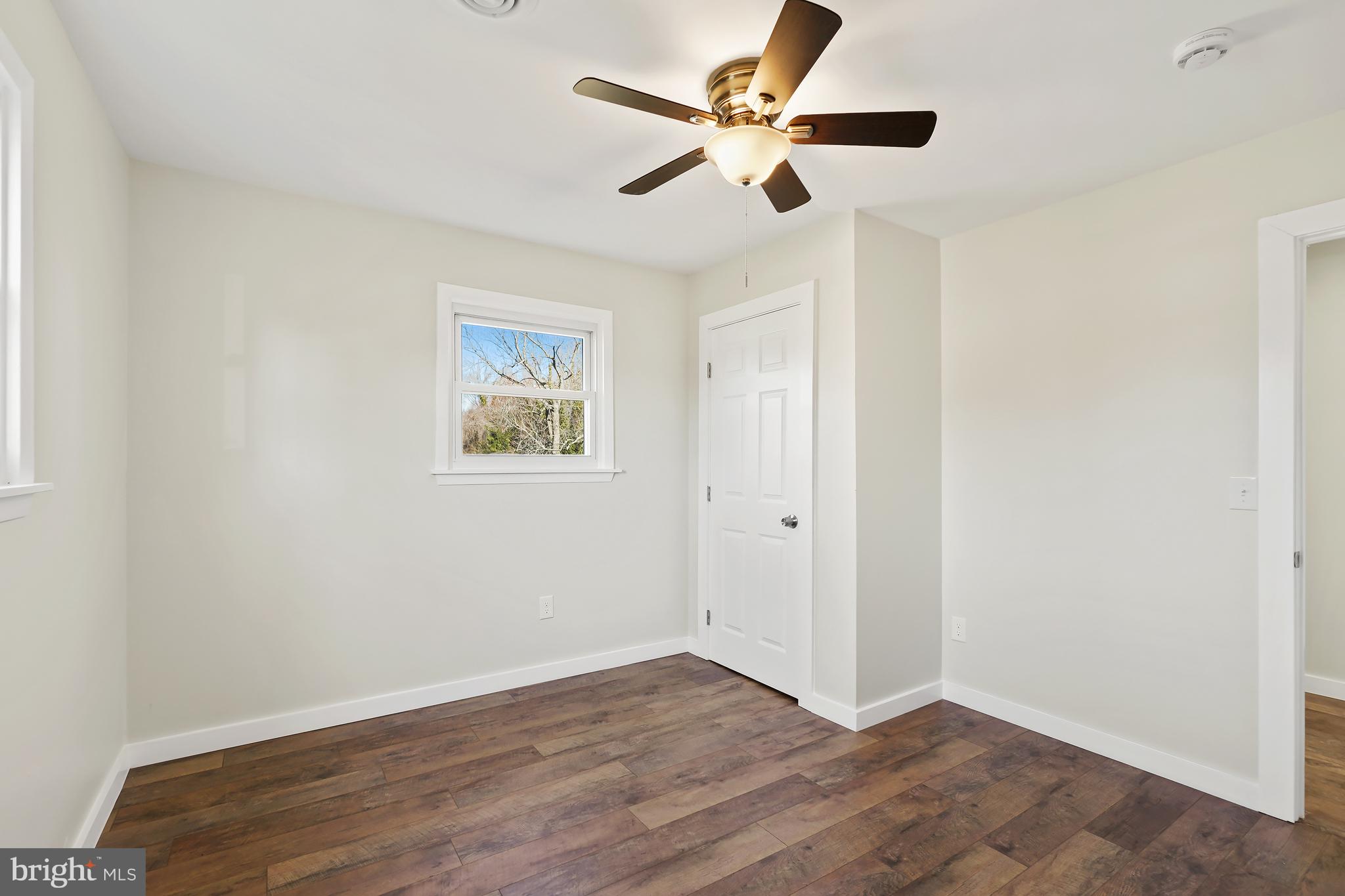 1546 Ridgely Drive Edgewater, MD 21037 - Photo 34 of 55 a view of an empty room with wooden floor