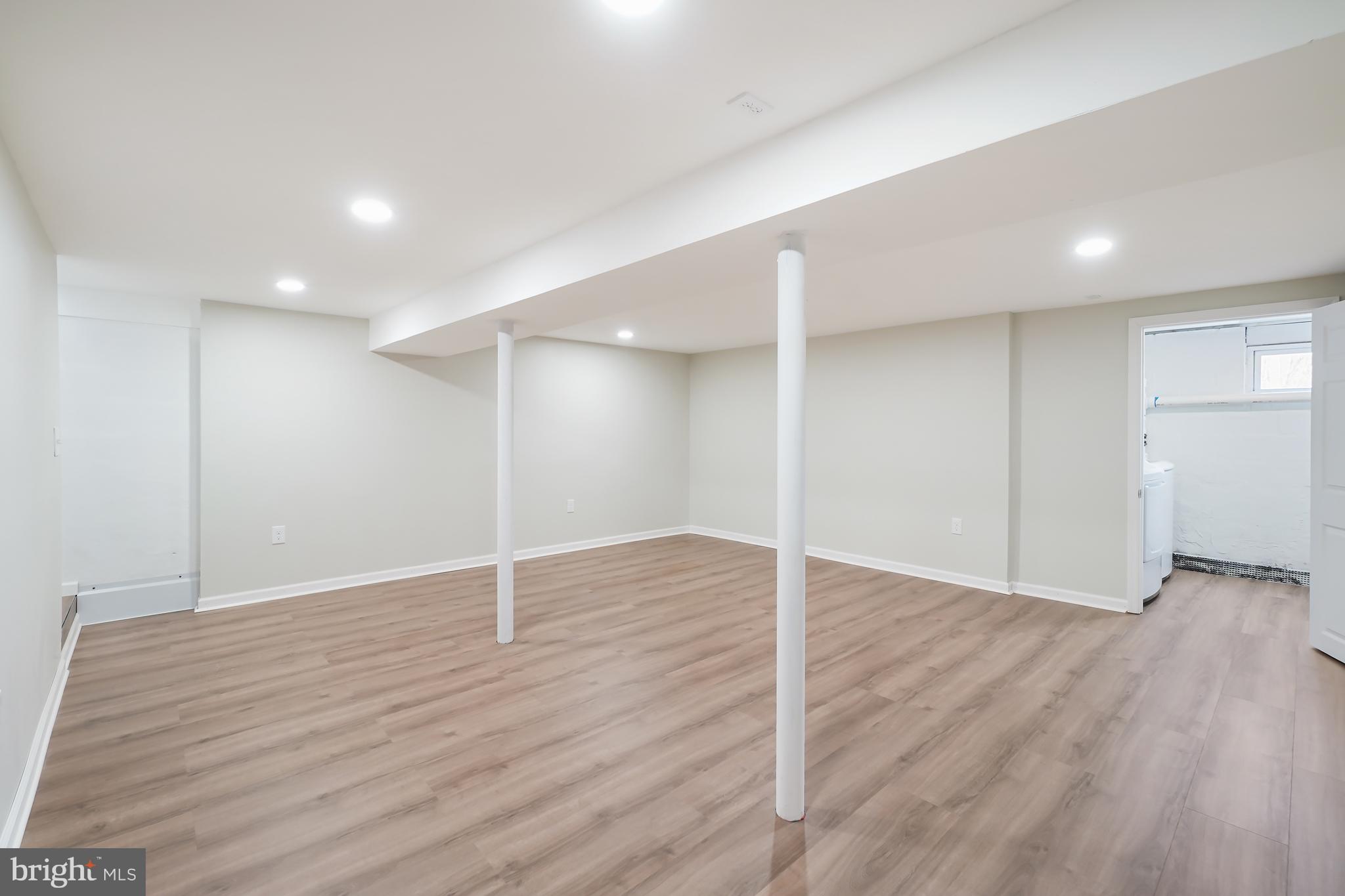 1546 Ridgely Drive Edgewater, MD 21037 - Photo 38 of 55 a view of an empty room with wooden floor