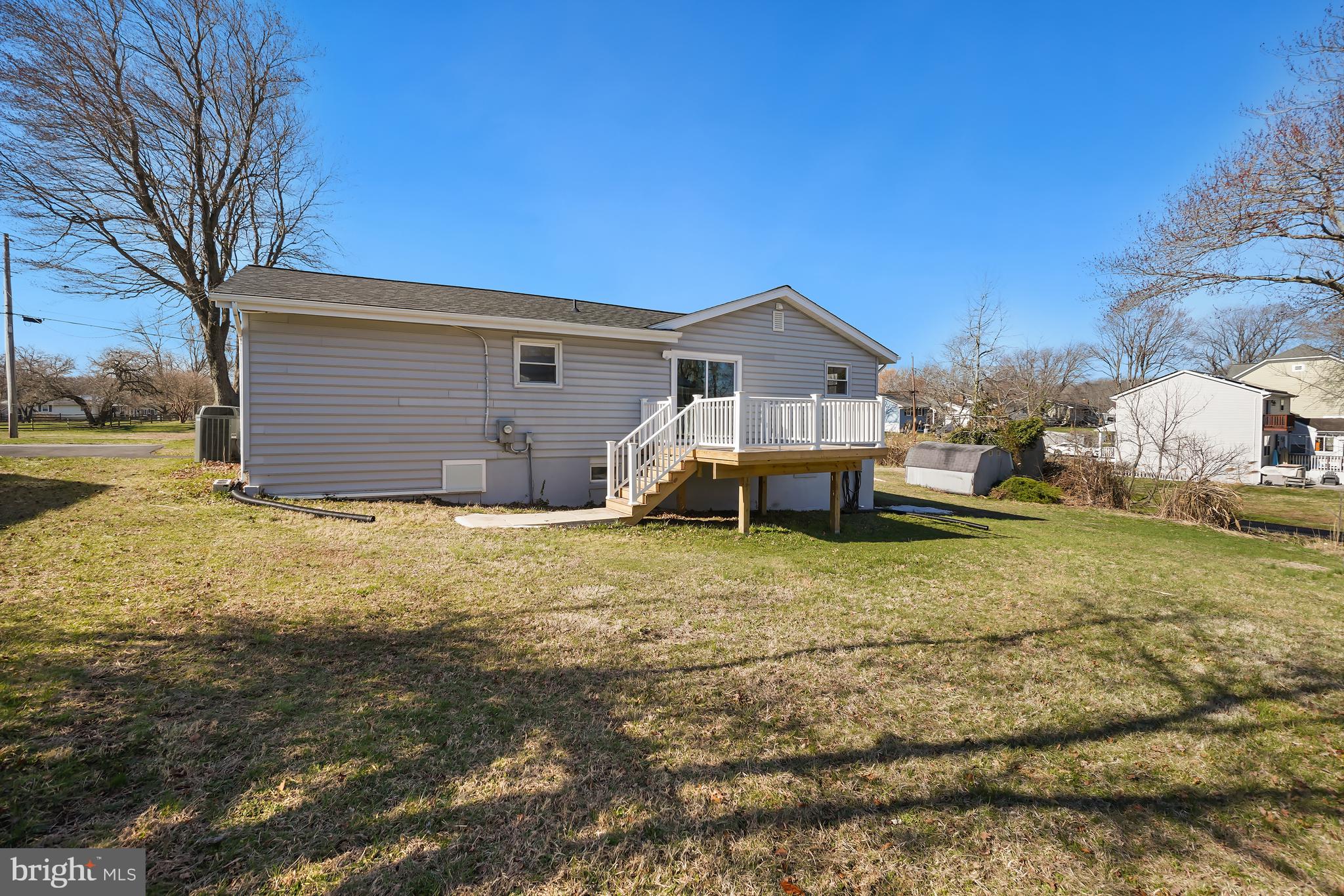 1546 Ridgely Drive Edgewater, MD 21037 - Photo 45 of 55 a view of a house with a yard
